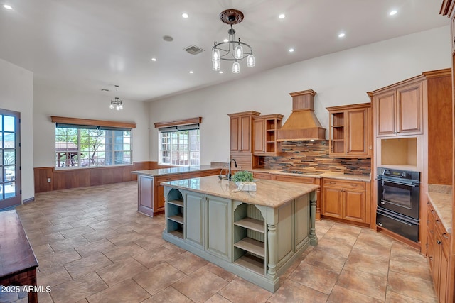 1925 W Tanya Trl, Phoenix, AZ 85086 - kitchen featuring open shelves, custom exhaust hood, a warming drawer, black appliances, and a wainscoted wall