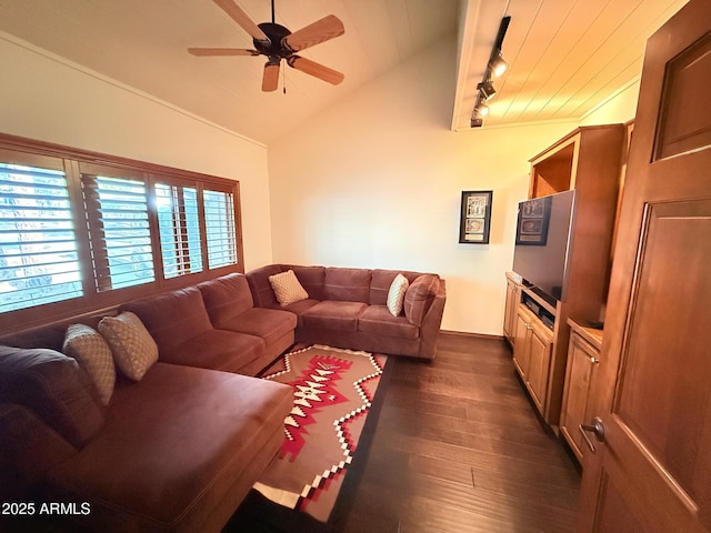 living area with dark wood finished floors, rail lighting, lofted ceiling, and ceiling fan