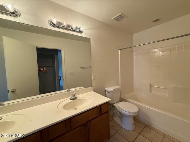 15655 N 29th St, Phoenix, AZ 85032 - full bath with tile patterned flooring, double vanity, and bathtub / shower combination