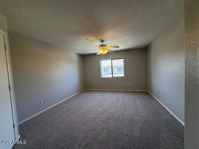 15655 N 29th St, Phoenix, AZ 85032 - carpeted empty room featuring ceiling fan and baseboards