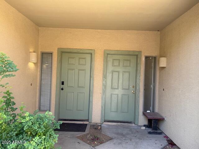 15655 N 29th St, Phoenix, AZ 85032 - view of exterior entry with stucco siding
