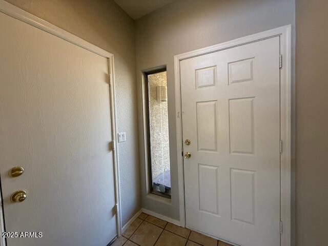 15655 N 29th St, Phoenix, AZ 85032 - entrance foyer with light tile patterned floors and baseboards