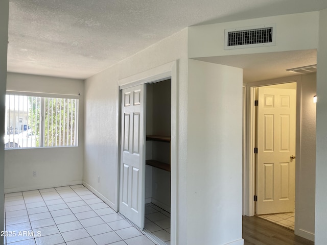 143 S Mountain Rd, Apache Junction, AZ 85120 - tiled spare room with a textured ceiling
