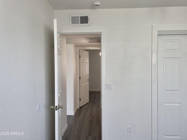 143 S Mountain Rd, Apache Junction, AZ 85120 - hall with baseboards and dark wood-style flooring
