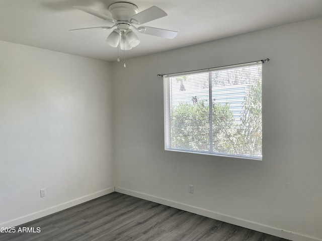 143 S Mountain Rd, Apache Junction, AZ 85120 - empty room with dark wood-style floors and a ceiling fan
