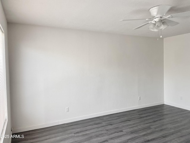 143 S Mountain Rd, Apache Junction, AZ 85120 - empty room with dark wood-style flooring and a ceiling fan