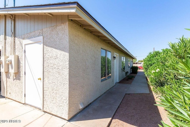 143 S Mountain Rd, Apache Junction, AZ 85120 - view of side of home featuring stucco siding