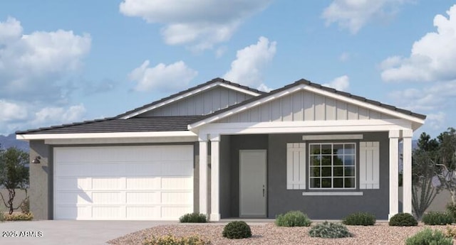 view of front of house with a garage, driveway, and board and batten siding