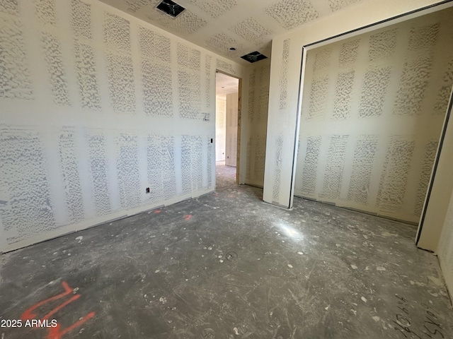 unfurnished bedroom featuring a closet