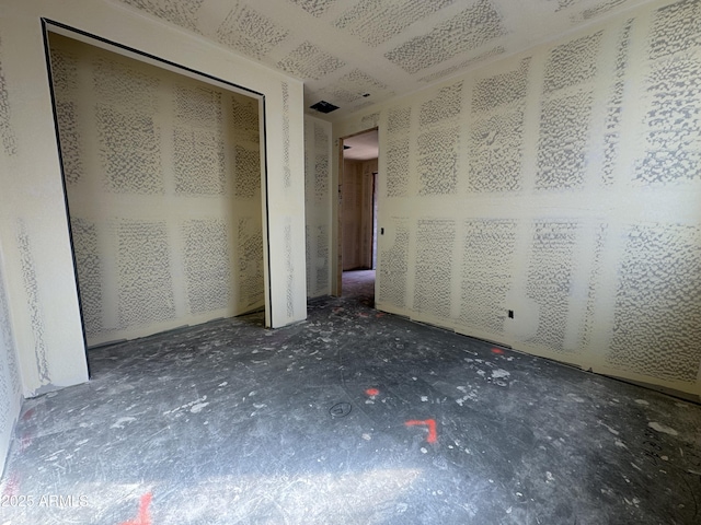 unfurnished bedroom featuring a closet