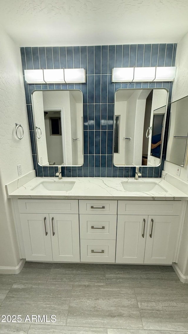 1003 E Princeton Ave, Gilbert, AZ 85234 - full bathroom with double vanity and wood finished floors