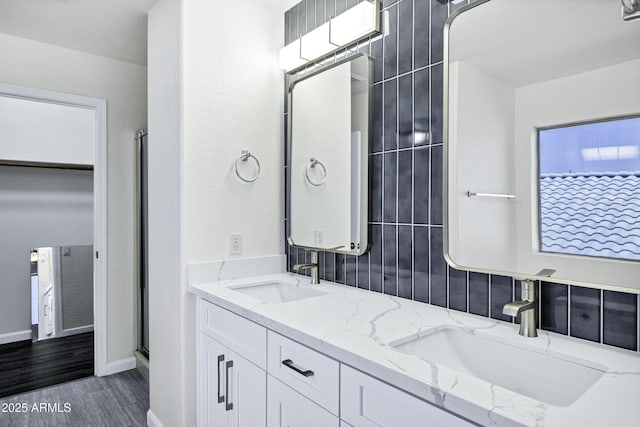 1003 E Princeton Ave, Gilbert, AZ 85234 - full bath with double vanity, wood finished floors, and a shower with shower door