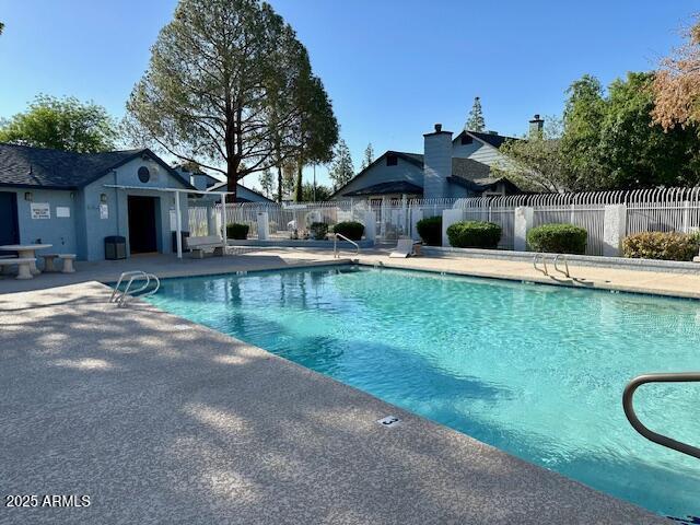 10101 N 91st Ave Unit 88, Peoria, AZ 85345 - community pool featuring a patio