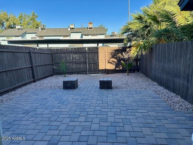 10101 N 91st Ave Unit 88, Peoria, AZ 85345 - fenced backyard featuring a patio area