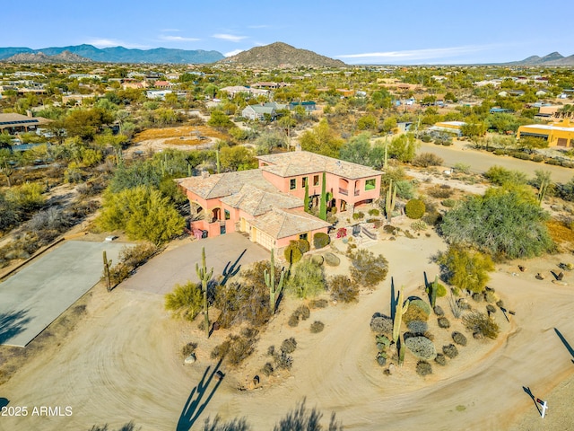 drone / aerial view featuring a mountain view