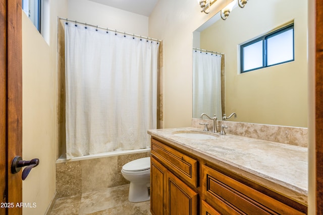 full bathroom featuring vanity, toilet, and shower / bath combo