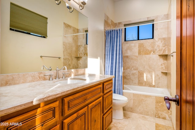 full bathroom with vanity, toilet, and shower / bath combo