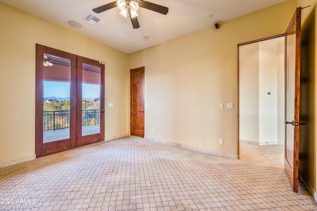 empty room with light carpet and ceiling fan