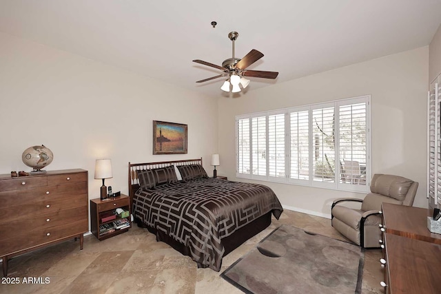 6966 E Bramble Berry Ln, Scottsdale, AZ 85266 - bedroom featuring baseboards and ceiling fan