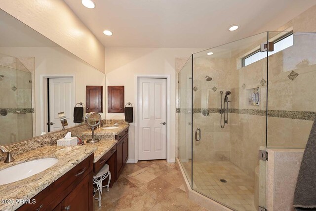 6966 E Bramble Berry Ln, Scottsdale, AZ 85266 - full bathroom featuring double vanity, a shower stall, and recessed lighting