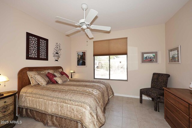 6966 E Bramble Berry Ln, Scottsdale, AZ 85266 - bedroom with light tile patterned floors, ceiling fan, and baseboards