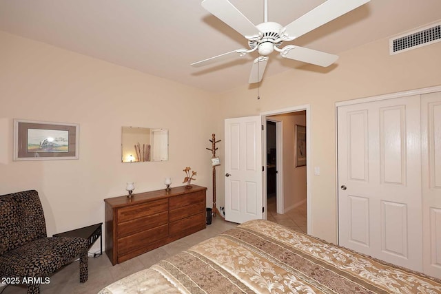 6966 E Bramble Berry Ln, Scottsdale, AZ 85266 - bedroom featuring light tile patterned floors, vaulted ceiling, a closet, and ceiling fan