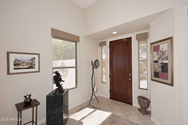 6966 E Bramble Berry Ln, Scottsdale, AZ 85266 - entrance foyer featuring light tile patterned floors and baseboards