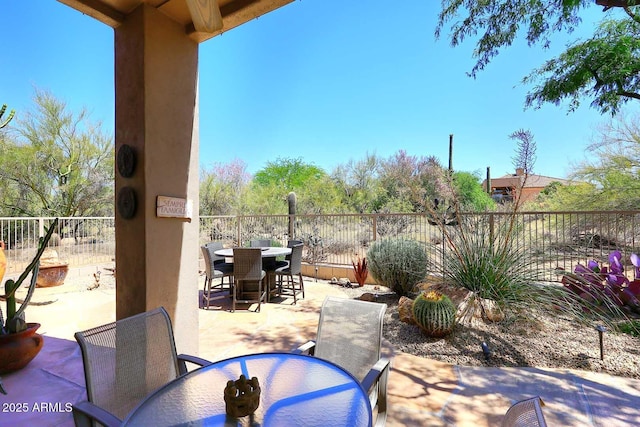 6966 E Bramble Berry Ln, Scottsdale, AZ 85266 - view of patio featuring outdoor dining area