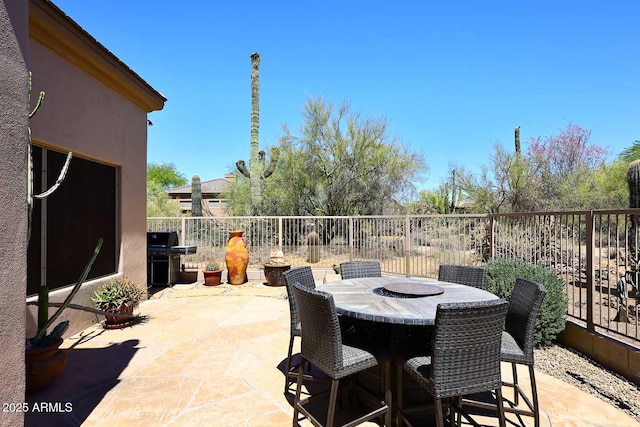 6966 E Bramble Berry Ln, Scottsdale, AZ 85266 - view of patio featuring outdoor dining area