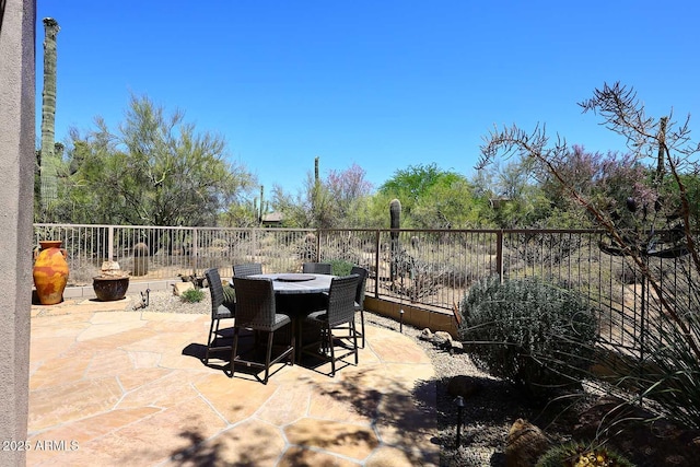 6966 E Bramble Berry Ln, Scottsdale, AZ 85266 - fenced backyard featuring outdoor dining space and a patio
