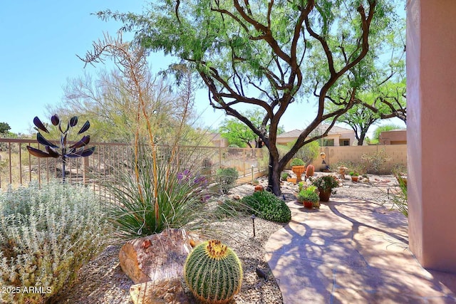 6966 E Bramble Berry Ln, Scottsdale, AZ 85266 - fenced backyard with a patio area