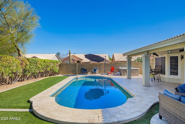 view of swimming pool featuring a patio, a fenced backyard, a jacuzzi, and a fenced in pool