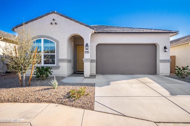 view of front of property with a garage