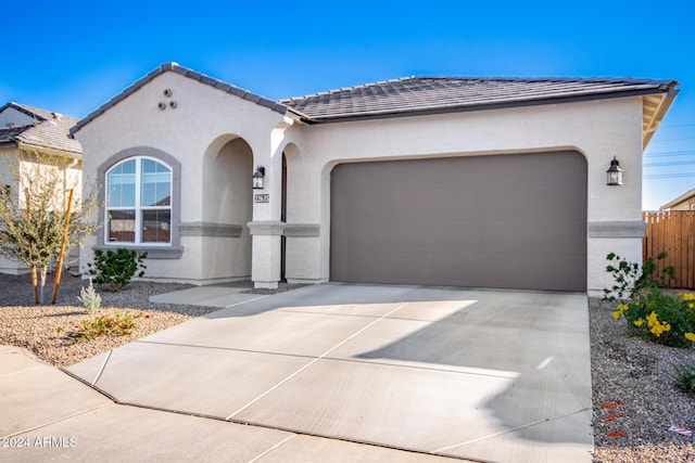 view of front of home with a garage