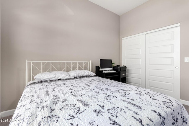 carpeted bedroom featuring a closet