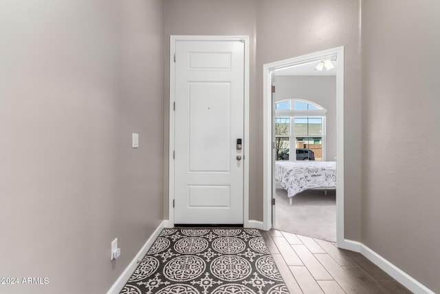 doorway featuring hardwood / wood-style floors