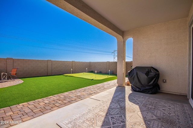 view of patio / terrace featuring a grill