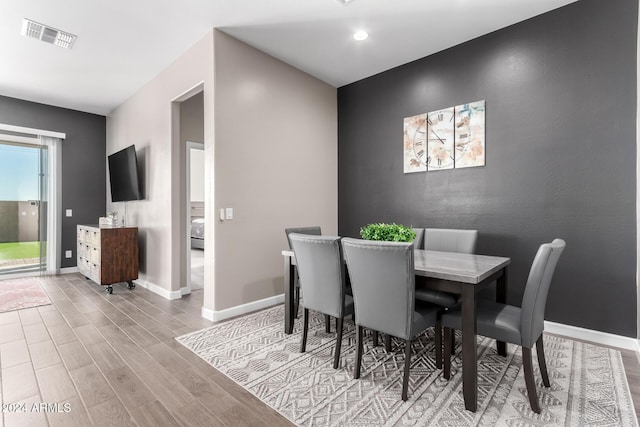 dining room featuring light hardwood / wood-style floors