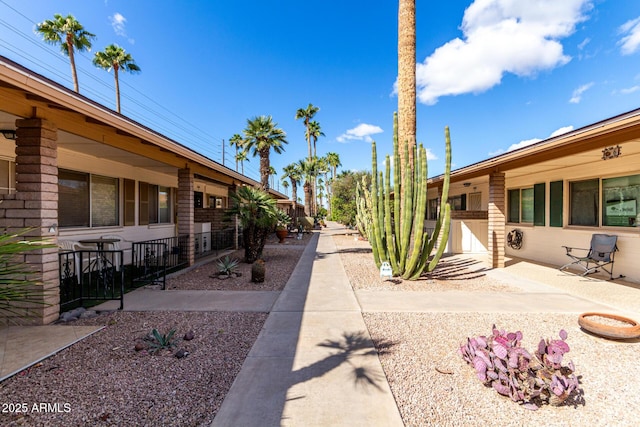 view of property's community featuring a patio