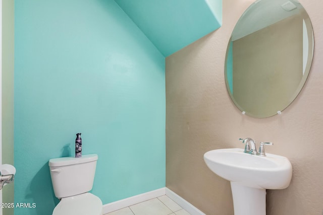 1367 S Country Club Dr Unit 1327, Mesa, AZ 85210 - bathroom featuring toilet, tile patterned flooring, baseboards, and lofted ceiling