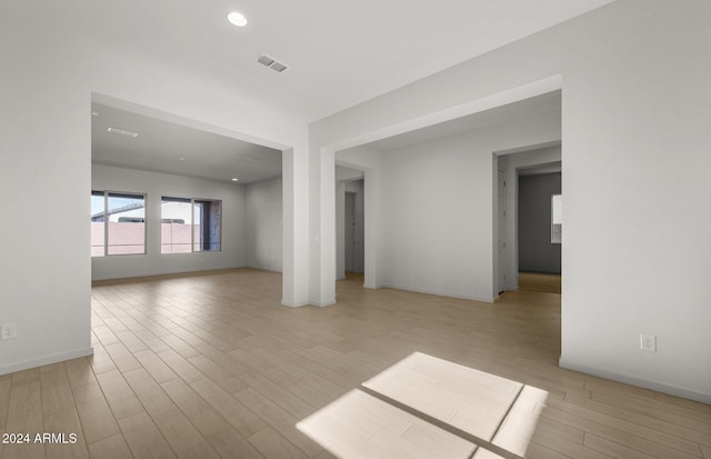 unfurnished room with light hardwood / wood-style flooring