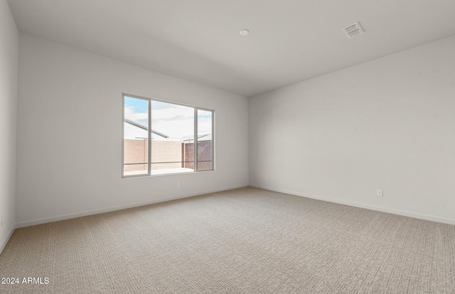 empty room with carpet flooring