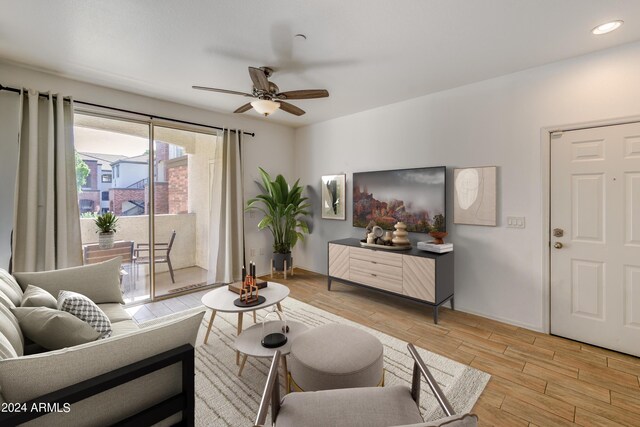 bedroom featuring light hardwood / wood-style floors and ceiling fan