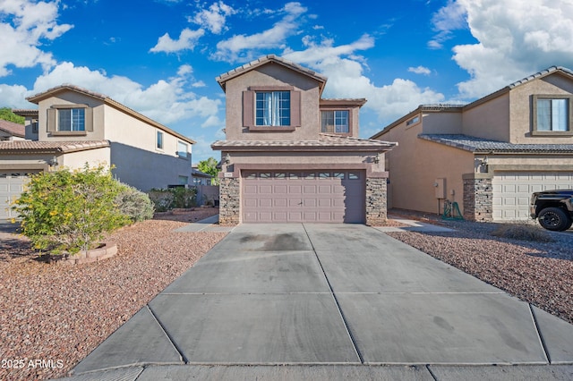 11383 W Pima St, Avondale, AZ 85323 - traditional-style house featuring a garage, driveway, stucco siding, stone siding, and a tiled roof