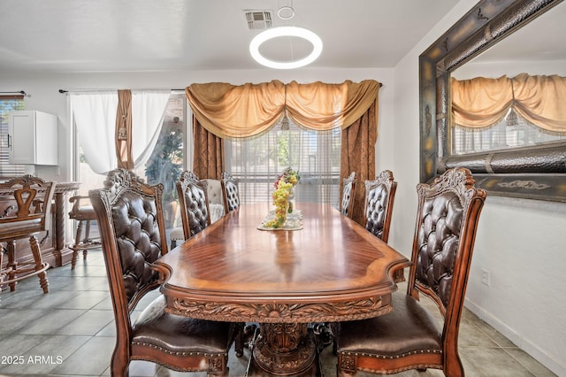 11383 W Pima St, Avondale, AZ 85323 - dining space featuring light tile patterned floors