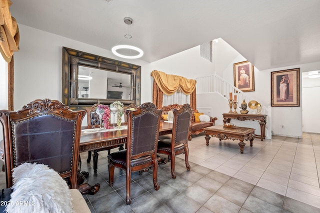 11383 W Pima St, Avondale, AZ 85323 - dining room with stairs and tile patterned floors