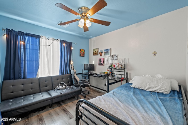 11383 W Pima St, Avondale, AZ 85323 - bedroom with wood finished floors and a ceiling fan