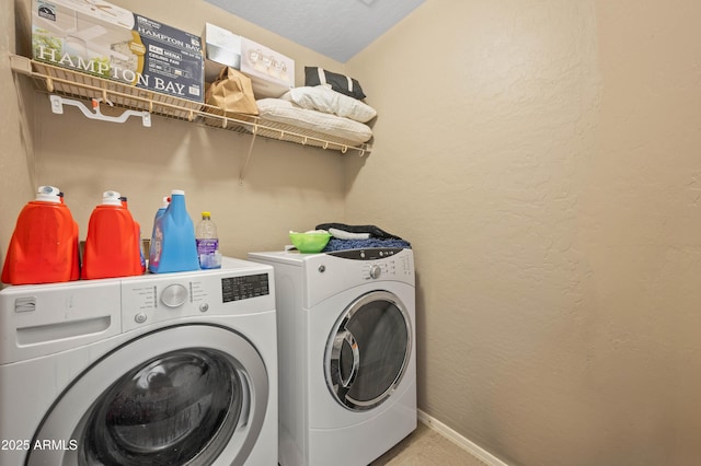 11383 W Pima St, Avondale, AZ 85323 - washroom with washing machine and clothes dryer and a textured wall