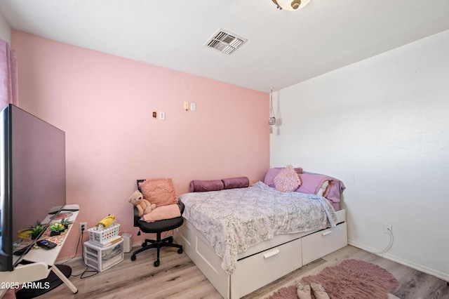 11383 W Pima St, Avondale, AZ 85323 - bedroom featuring light wood-type flooring
