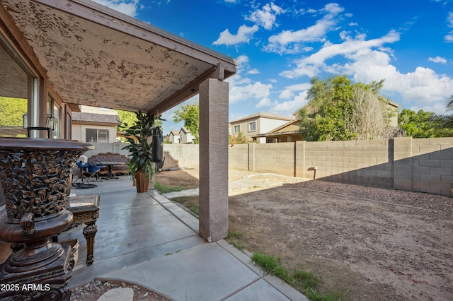 11383 W Pima St, Avondale, AZ 85323 - fenced backyard with a patio and a residential view